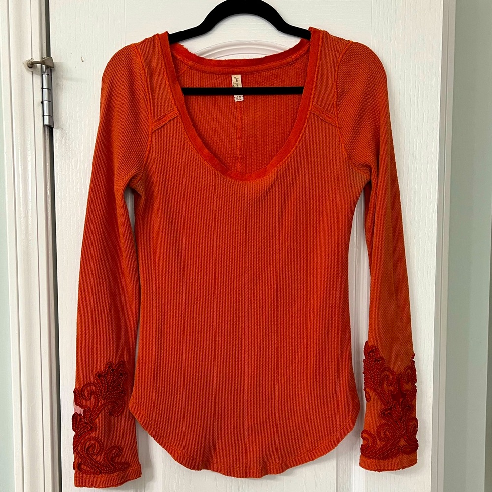 Free People long sleeve orange shirt.